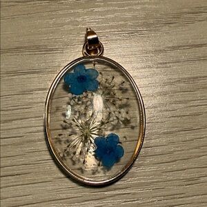 Gold tone Floral Pendant Necklace with Blue Accents